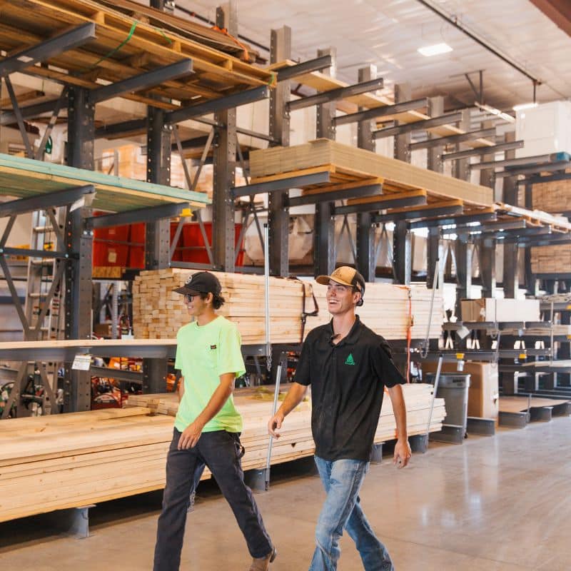 Employees Walking Through Lumber Center