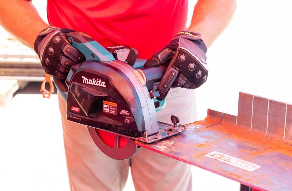 A BFS Alliance worker using a Makita circular saw